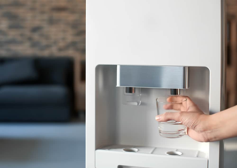 how does a hot water dispenser work